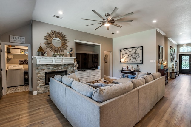1719 Wheatberry Ln, Allen, TX 75002 - living area with washer / dryer, a ceiling fan, a fireplace, wood finished floors, and recessed lighting