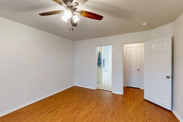 637 Stirrup Bar Dr, Fort Worth, TX 76179 - unfurnished bedroom with light wood-style flooring, baseboards, and ceiling fan