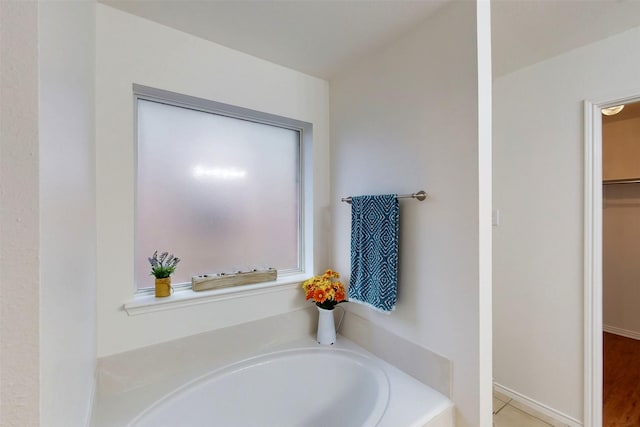637 Stirrup Bar Dr, Fort Worth, TX 76179 - bathroom with a bath and a spacious closet