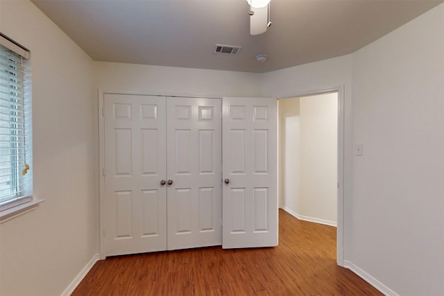 637 Stirrup Bar Dr, Fort Worth, TX 76179 - unfurnished bedroom with wood finished floors, baseboards, and a closet
