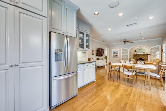 5447 Mccommas Blvd, Dallas, TX 75206 - kitchen with stainless steel fridge with ice dispenser, ornamental molding, ceiling fan, recessed lighting, and light wood-style flooring