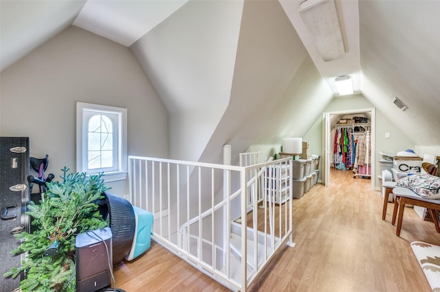 5447 Mccommas Blvd, Dallas, TX 75206 - additional living space with vaulted ceiling and wood finished floors