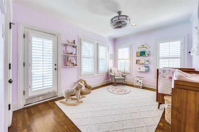 5447 Mccommas Blvd, Dallas, TX 75206 - bedroom featuring dark wood-style floors, multiple windows, ornamental molding, and baseboards