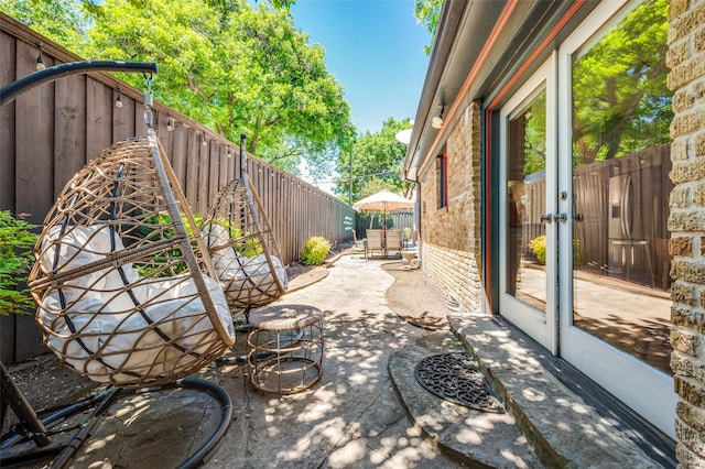 5447 Mccommas Blvd, Dallas, TX 75206 - fenced backyard with a patio