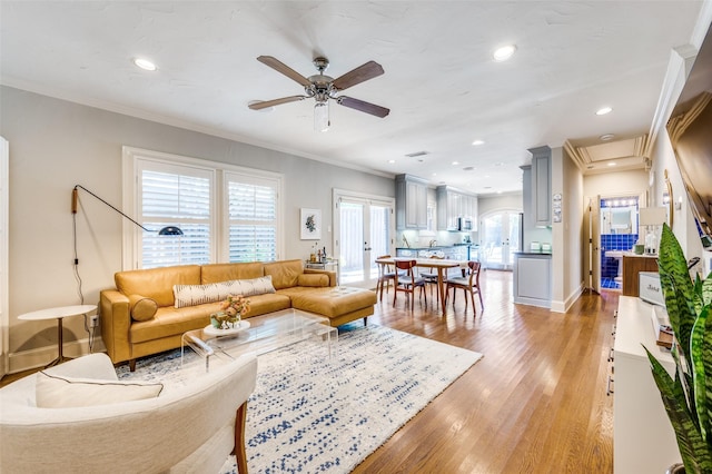 5447 Mccommas Blvd, Dallas, TX 75206 - living area featuring ceiling fan, light wood finished floors, crown molding, recessed lighting, and baseboards