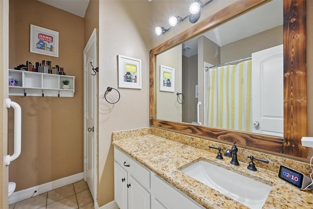 2101 Creekdale Dr, Denton, TX 76210 - bathroom with tile patterned floors, vanity, toilet, a shower with curtain, and baseboards
