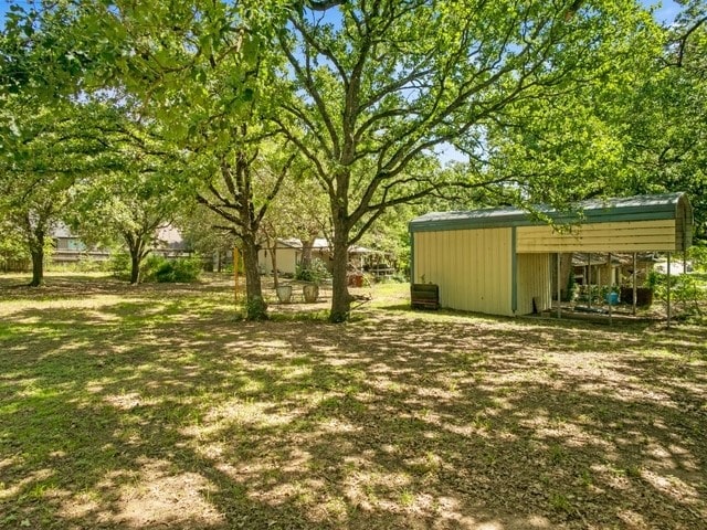 102 Ford Cir, Gun Barrel City, TX 75156 - view of yard featuring an outdoor structure
