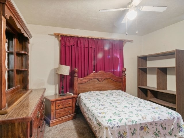 102 Ford Cir, Gun Barrel City, TX 75156 - carpeted bedroom featuring ceiling fan