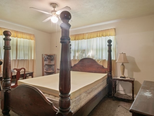102 Ford Cir, Gun Barrel City, TX 75156 - carpeted bedroom featuring ceiling fan