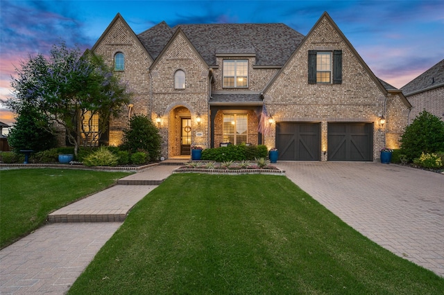 2749 Casa Grande Way, Celina, TX 75009 - view of front of property featuring driveway, a front yard, brick siding, a garage, and a shingled roof