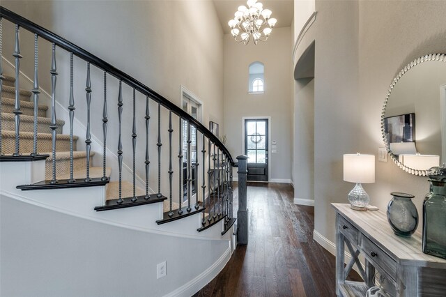 2749 Casa Grande Way, Celina, TX 75009 - foyer featuring a high ceiling, baseboards, hardwood / wood-style floors, stairs, and a chandelier