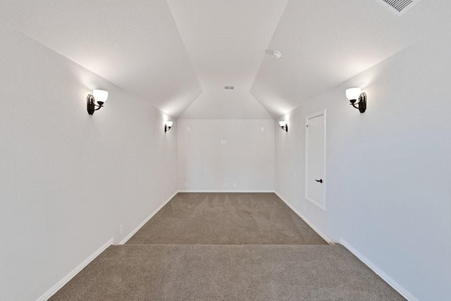 914 Park Vista Dr, Justin, TX 76247 - carpeted cinema with vaulted ceiling and baseboards