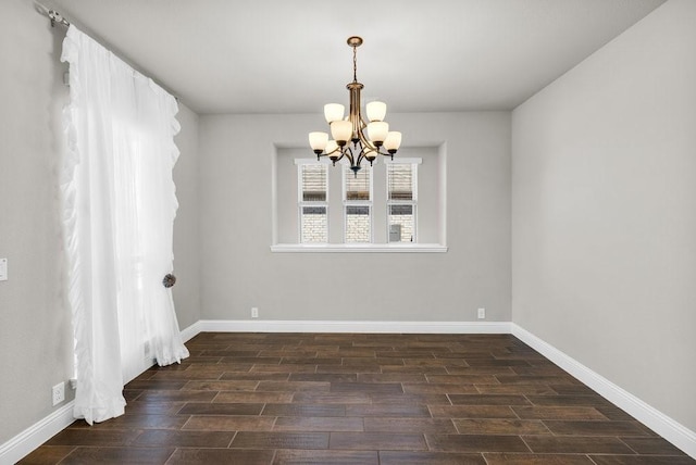 914 Park Vista Dr, Justin, TX 76247 - empty room featuring a chandelier, wood finish floors, and baseboards