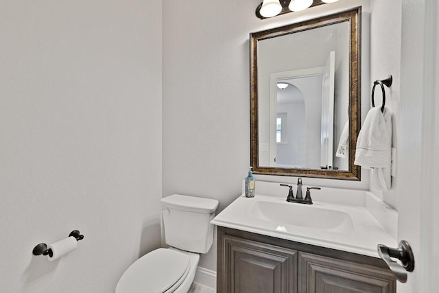 914 Park Vista Dr, Justin, TX 76247 - bathroom featuring toilet, vanity, and baseboards