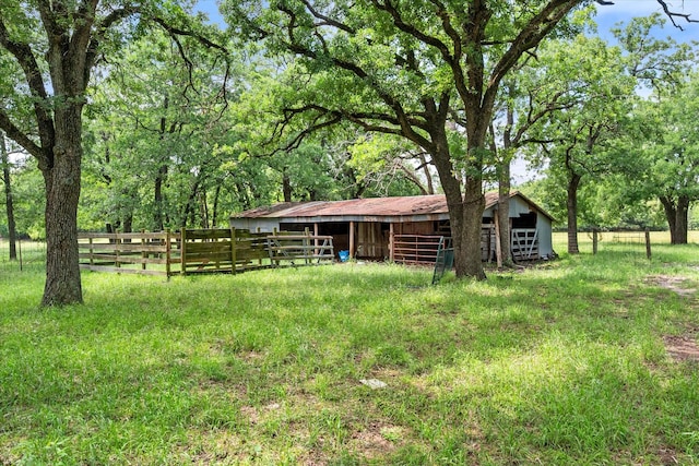 1890 Oak Valley Ln, Corsicana, TX 75110 - view of yard featuring an exterior structure and an outdoor structure