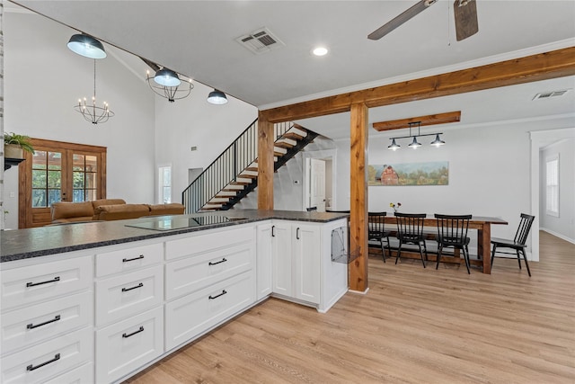 173 Cedar Ridge Dr, China Spring, TX 76633 - kitchen featuring black electric cooktop, light wood-style flooring, ceiling fan, white cabinetry, and recessed lighting