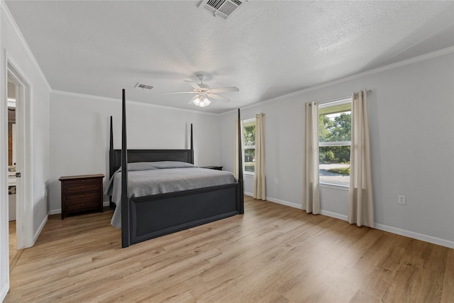 173 Cedar Ridge Dr, China Spring, TX 76633 - bedroom featuring light wood-style floors, ornamental molding, baseboards, a textured ceiling, and ceiling fan