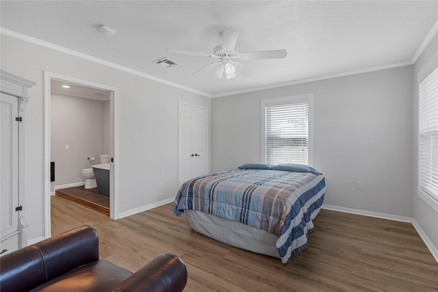 173 Cedar Ridge Dr, China Spring, TX 76633 - bedroom with wood finished floors, ornamental molding, baseboards, ensuite bathroom, and a ceiling fan