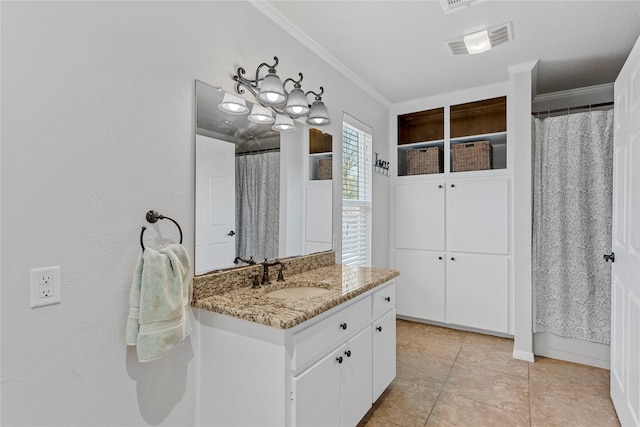 173 Cedar Ridge Dr, China Spring, TX 76633 - bathroom featuring crown molding, vanity, and tile patterned floors