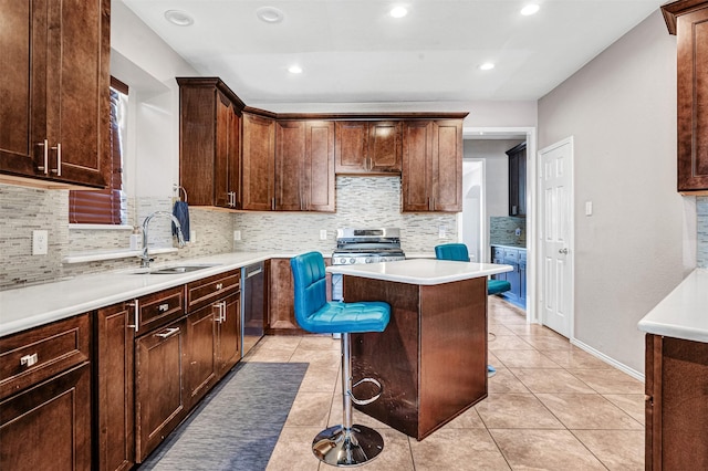 4518 Park Meadow Ct, Garland, TX 75043 - kitchen featuring a sink, stainless steel appliances, backsplash, light countertops, and a center island