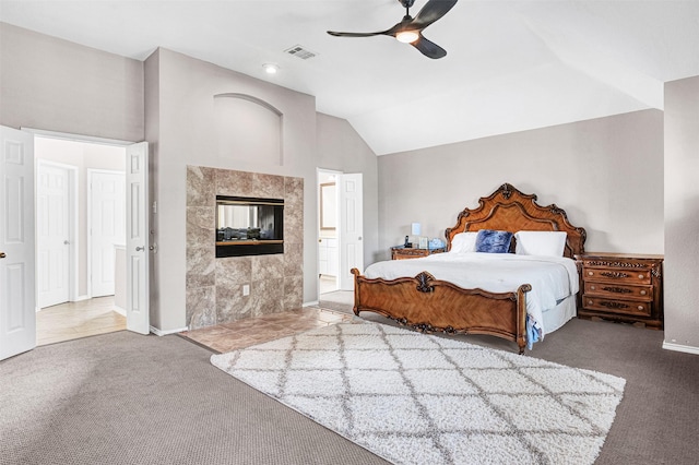4518 Park Meadow Ct, Garland, TX 75043 - carpeted bedroom with vaulted ceiling, ceiling fan, baseboards, and ensuite bathroom