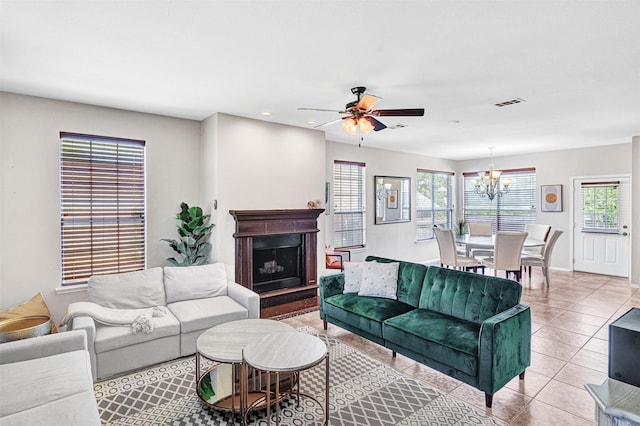 4518 Park Meadow Ct, Garland, TX 75043 - living room with healthy amount of natural light, a ceiling fan, a chandelier, recessed lighting, and light tile patterned floors