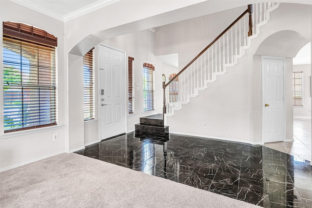 4518 Park Meadow Ct, Garland, TX 75043 - entrance foyer with arched walkways, baseboards, stairs, ornamental molding, and marble tiled flooring