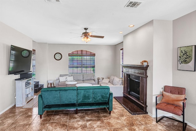4518 Park Meadow Ct, Garland, TX 75043 - living area featuring a glass covered fireplace, a ceiling fan, baseboards, and recessed lighting