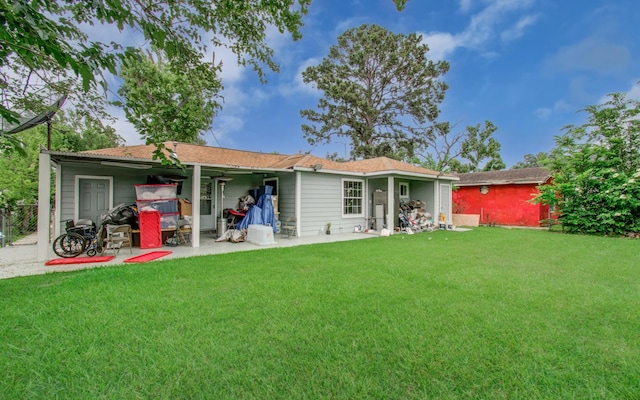 6625 Corbin St, Houston, TX 77055 - back of property featuring a lawn and a patio area