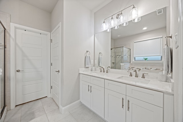 1404 Eagle Nest Dr, Azle, TX 76020 - bathroom with a shower stall, double vanity, tile patterned floors, and baseboards