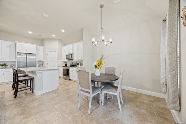1404 Eagle Nest Dr, Azle, TX 76020 - dining room featuring a chandelier, recessed lighting, baseboards, and light tile patterned flooring