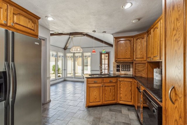 3109 Bullock Dr, Plano, TX 75023 - kitchen featuring stainless steel refrigerator with ice dispenser, a sink, a peninsula, lofted ceiling, and brown cabinetry