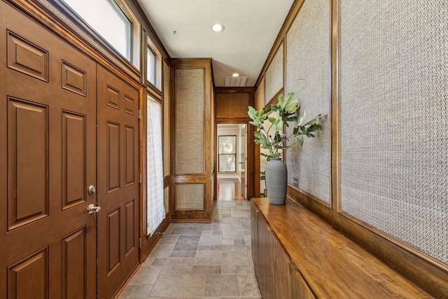 3109 Bullock Dr, Plano, TX 75023 - entrance foyer with stone finish flooring, baseboards, wallpapered walls, and recessed lighting