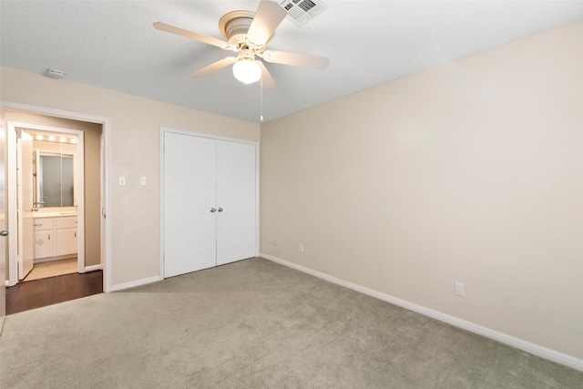4201 Westchester Dr, Waco, TX 76710 - unfurnished bedroom with carpet flooring, baseboards, a closet, and ceiling fan