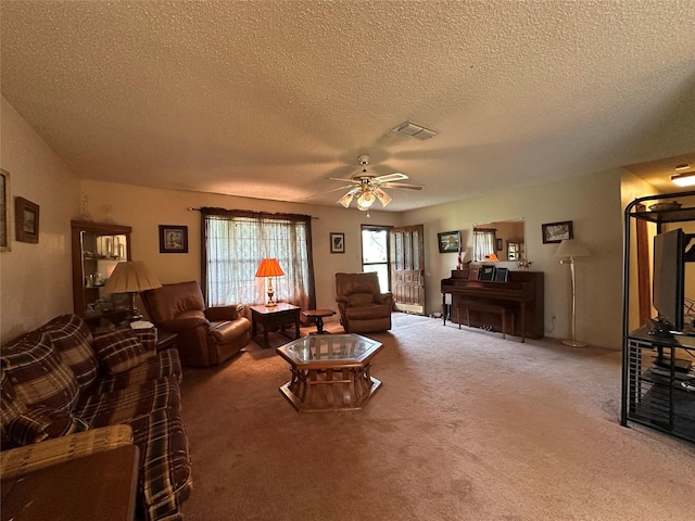 300 Hogg Creek Rd, Brownwood, TX 76801 - living area featuring carpet flooring, a textured ceiling, and ceiling fan