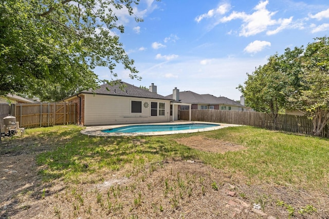 1132 Singletree Dr, Forney, TX 75126 - back of house with a chimney and brick siding
