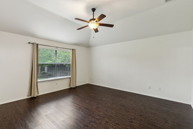 4033 Heavenly Way, Heartland, TX 75126 - unfurnished room featuring dark wood-style flooring, a ceiling fan, vaulted ceiling, and baseboards
