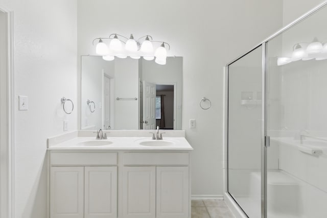 4033 Heavenly Way, Heartland, TX 75126 - bathroom featuring a shower stall, double vanity, and tile patterned floors