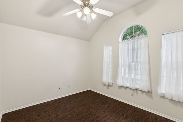 4033 Heavenly Way, Heartland, TX 75126 - spare room featuring dark wood-style flooring, ceiling fan, baseboards, and lofted ceiling