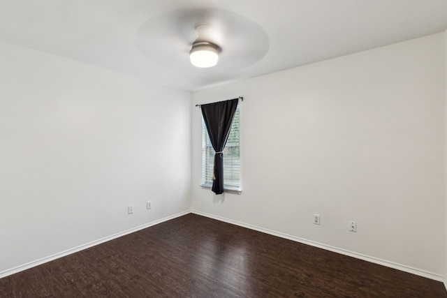 4033 Heavenly Way, Heartland, TX 75126 - unfurnished room with dark wood-type flooring, baseboards, and ceiling fan