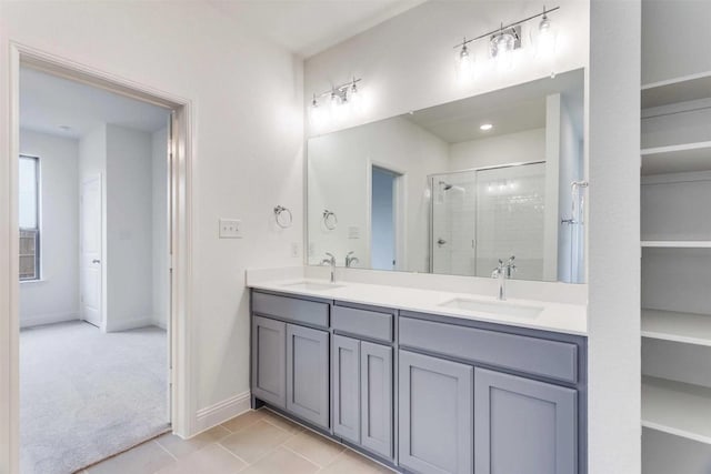 2316 Glasgow Way, Denton, TX 76207 - full bath with a stall shower, tile patterned flooring, double vanity, and baseboards