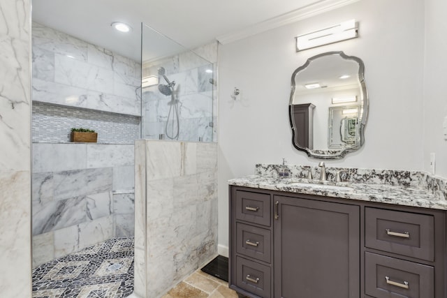 2902 Shady Lake Cir, Carrollton, TX 75006 - full bathroom featuring vanity, a marble finish shower, crown molding, recessed lighting, and stone finish flooring