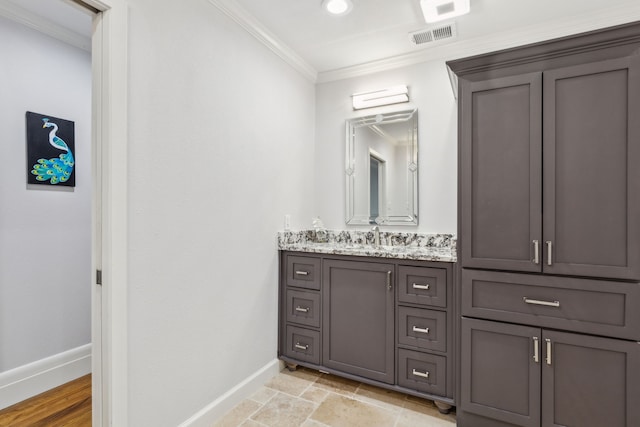 2902 Shady Lake Cir, Carrollton, TX 75006 - bathroom featuring crown molding, baseboards, and vanity