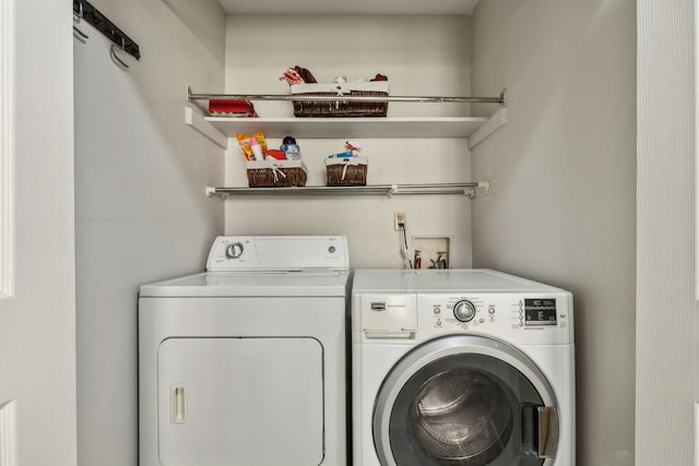 2902 Shady Lake Cir, Carrollton, TX 75006 - washroom featuring washing machine and clothes dryer