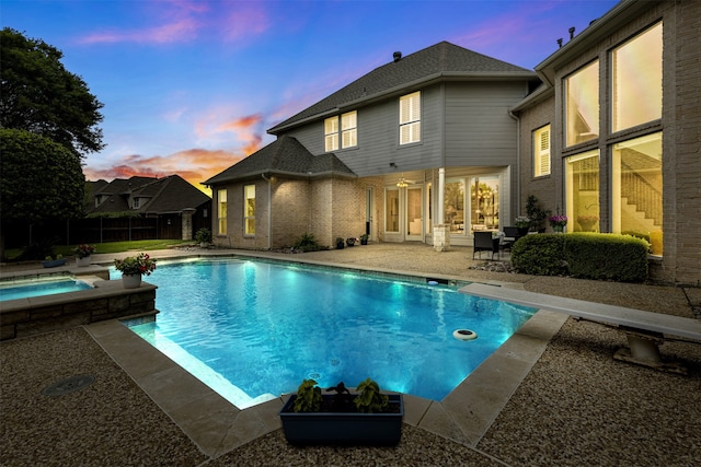 7513 Sugarbush Dr, Garland, TX 75044 - view of swimming pool with an in-ground hot tub, a patio, and a diving board