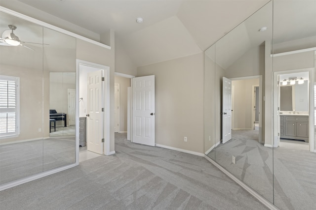 7513 Sugarbush Dr, Garland, TX 75044 - unfurnished bedroom featuring light carpet, lofted ceiling, and baseboards