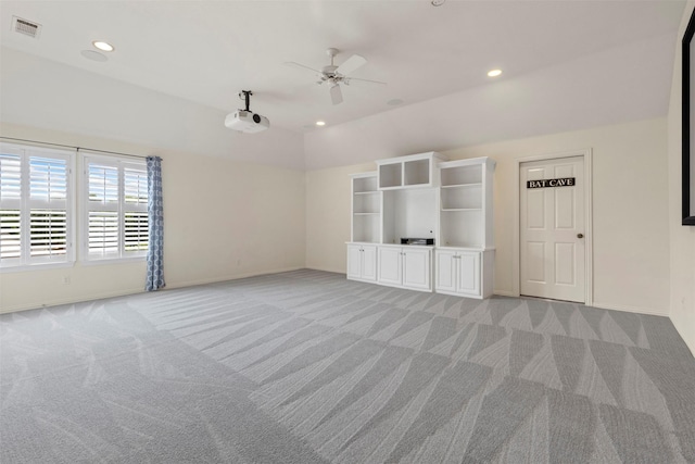 7513 Sugarbush Dr, Garland, TX 75044 - spare room with light colored carpet, ceiling fan, baseboards, recessed lighting, and vaulted ceiling