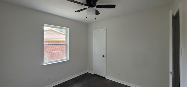 6216 Maurie Dr, Watauga, TX 76148 - unfurnished room featuring dark wood-type flooring, plenty of natural light, baseboards, and ceiling fan