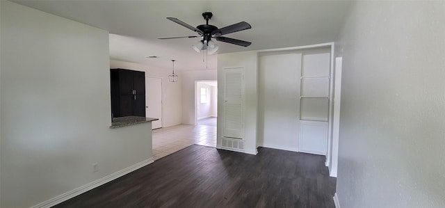 6216 Maurie Dr, Watauga, TX 76148 - spare room with a ceiling fan, wood finished floors, and baseboards