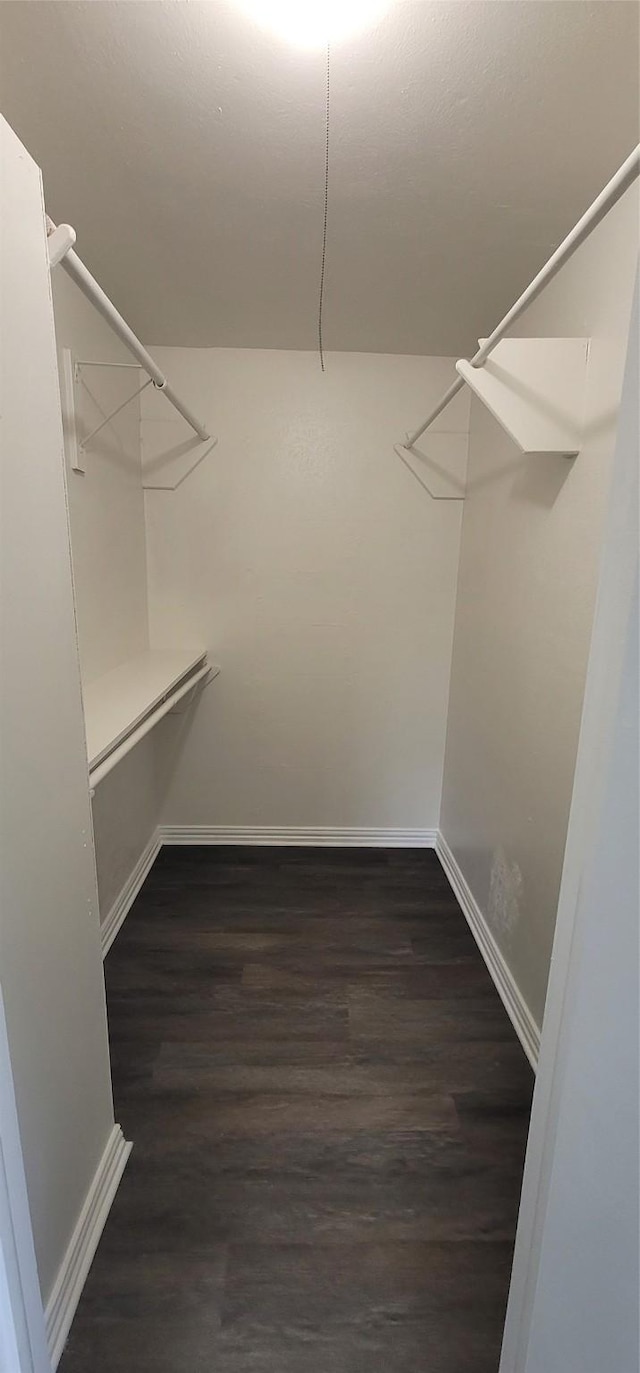 6216 Maurie Dr, Watauga, TX 76148 - spacious closet featuring wood finished floors